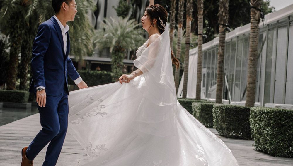 A BRIDE WEARING LACE WEDDING DRESS BY K GOWN DURING HER PRE-WEDDING PHOTOSHOOT IN SINGAPORE