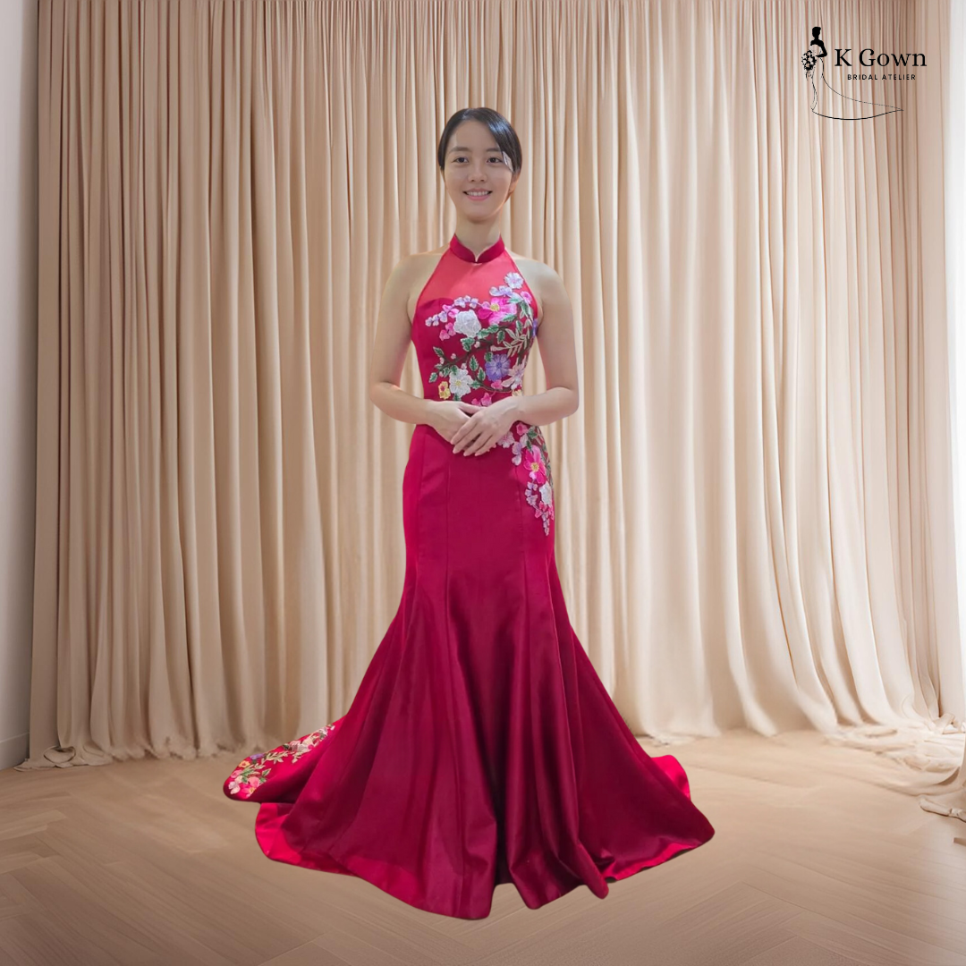 GUO DA LI IN SINGAPORE: A BRIDE'S GUIDE TO THE PROCESS, ITEMS & WHAT TO WEAR 7 SINGAPORE BRIDAL GOWN RED MODERN CHEONGSAM MERMAID WEDDING GOWN WITH A MANDARIN HALTER COLLAR AND FLORAL EMBROIDERY BY K GOWN SINGAPORE, A STATEMENT LOOK MANY BRIDES SAVE FOR THE TEA CEREMONY